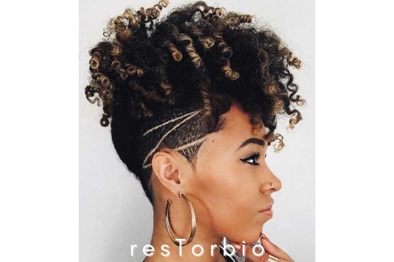 Short hair with a curly part on the top