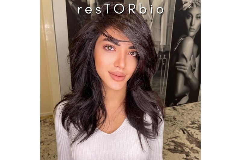 Feathered Hair with a Sweep-Away Fringe