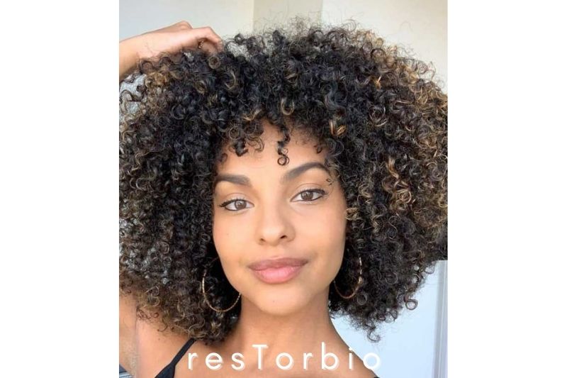 Natural Curly Hair with Bangs and Layers